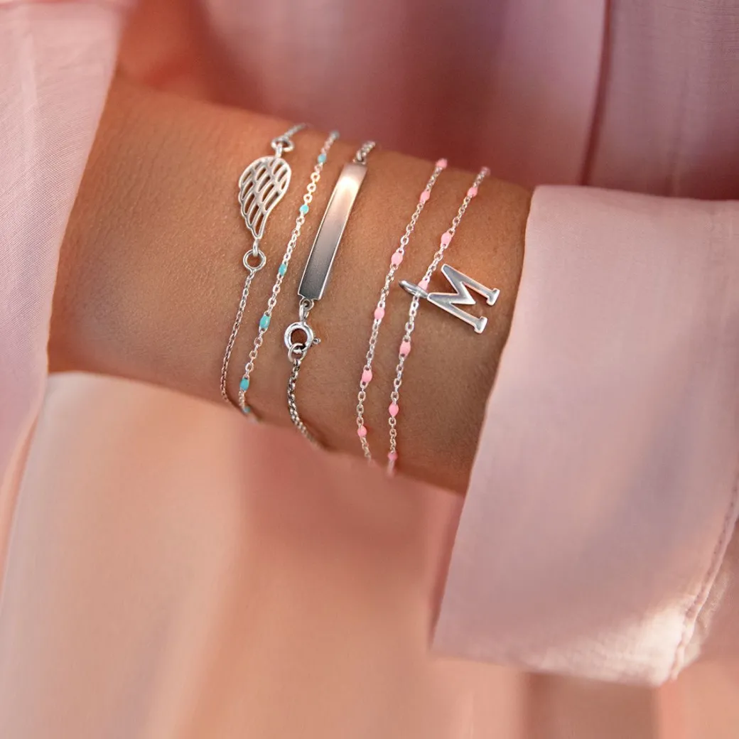 Bransoletka z literką z różową emalią posrebrzana^Lilou Fashion