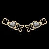 Kolczyki sztyfty ażurowe Icons z kryształami w kształcie serca pozłacane^Lilou Outlet